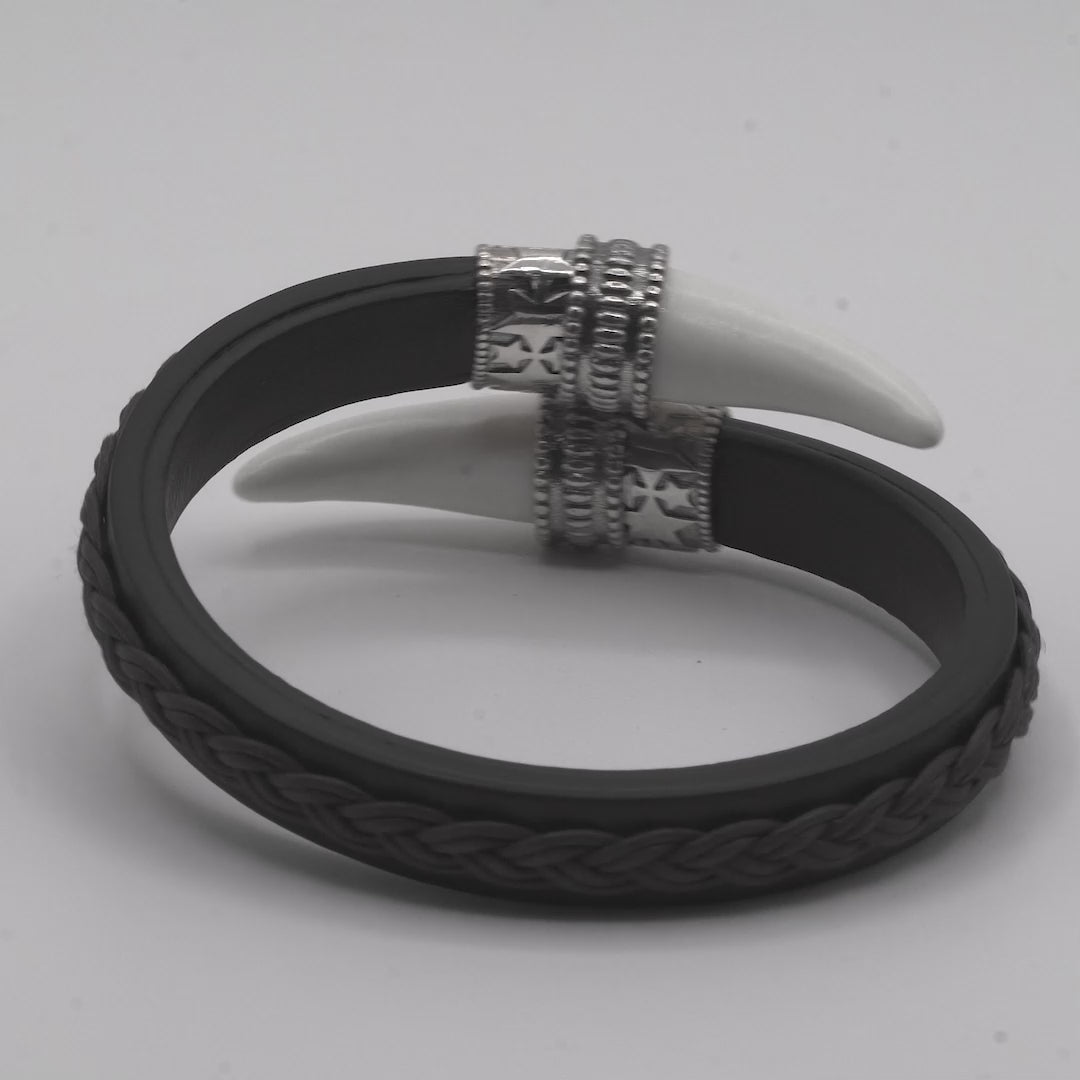 Pulsera cuero colmillos León