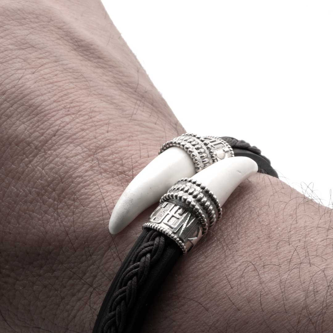 Pulsera cuero colmillos León