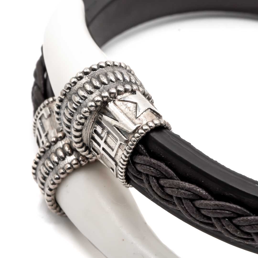 Pulsera cuero colmillos León