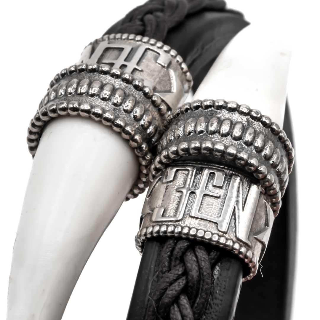 Pulsera cuero colmillos León